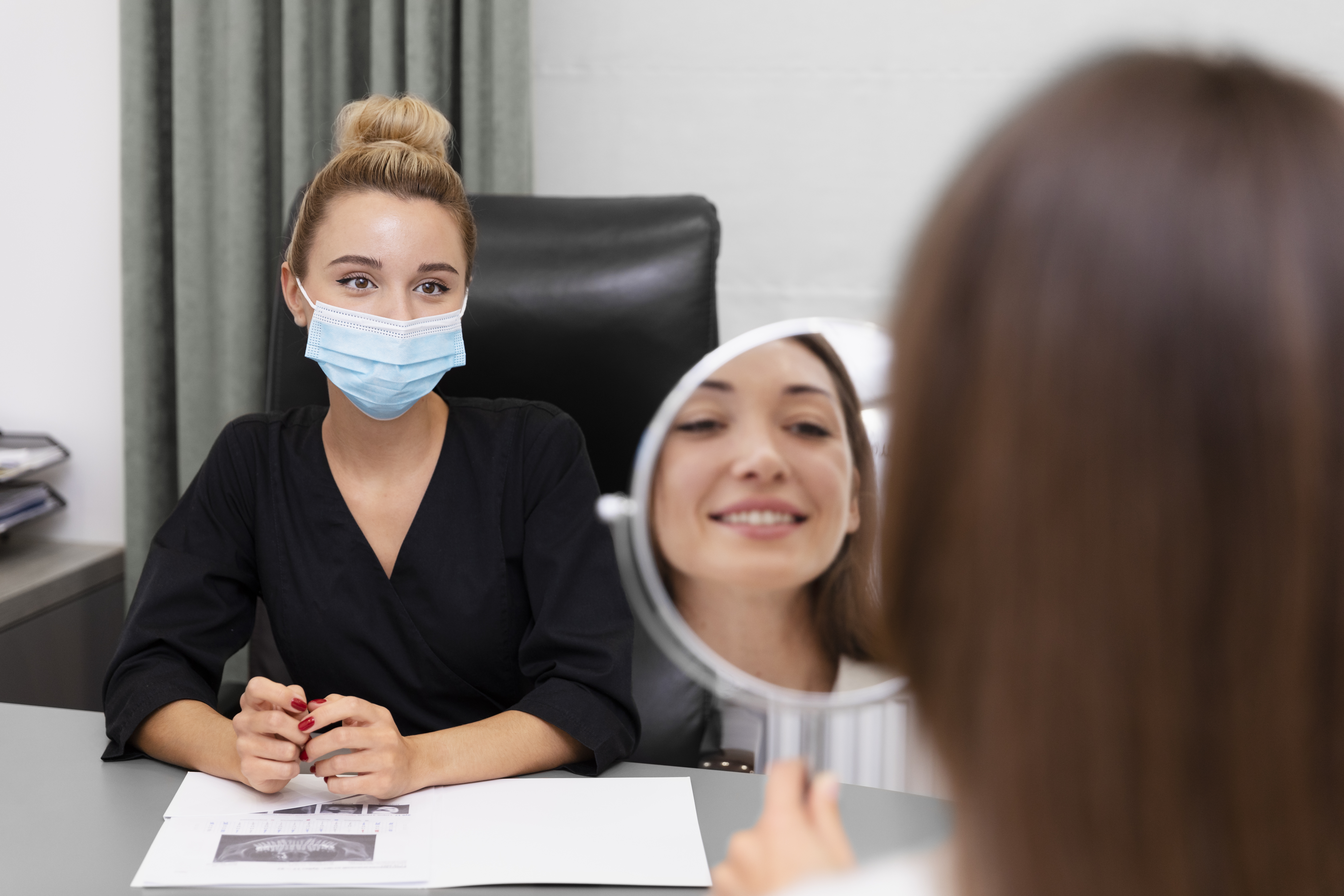 Ayurvedic doctor consulting patient for skin health